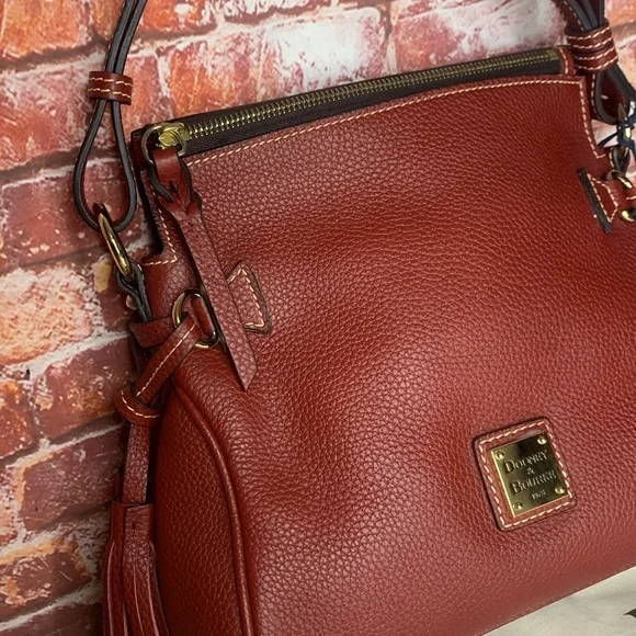 Dooney & Bourke Wine Red Pebbled Tassel Shoulder Bag